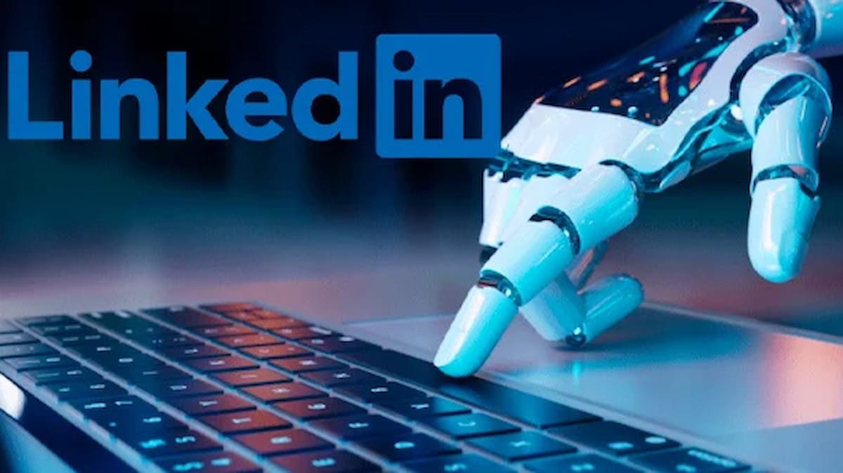 Image of a robotic hand pressing a laptop key and the LinkedIn logo